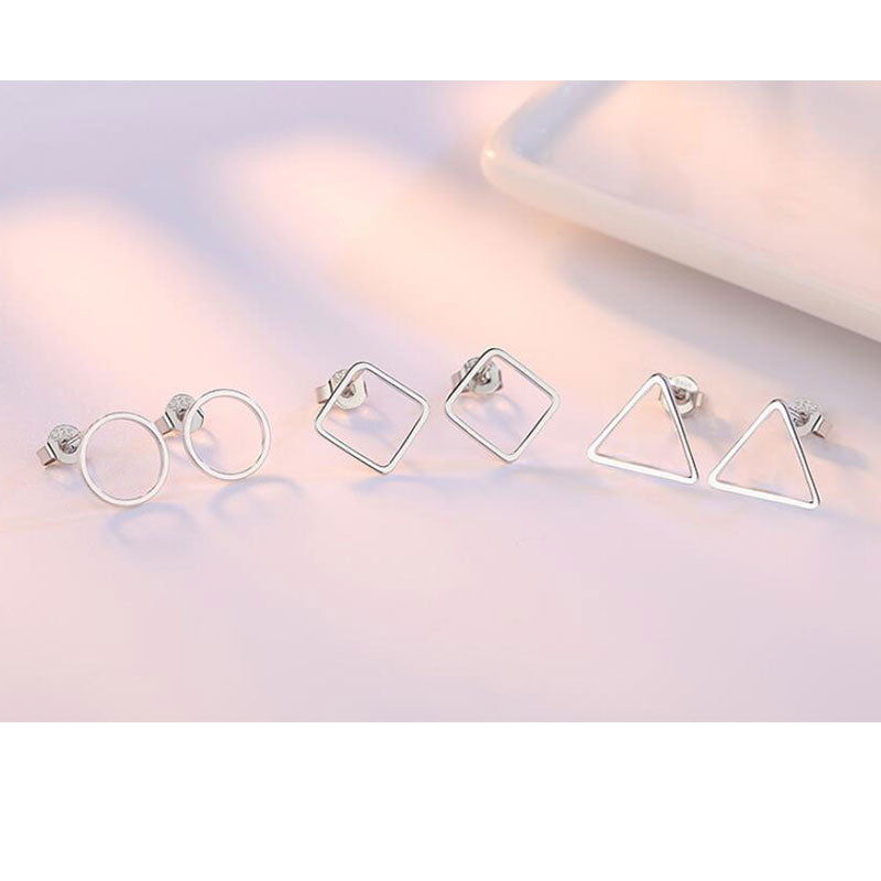 Silver earrings with geometric design