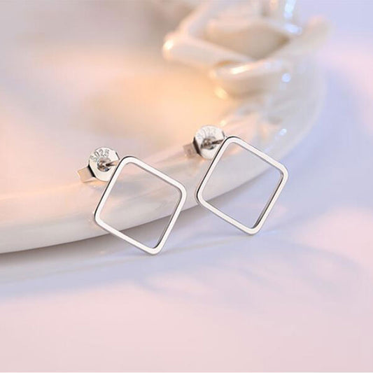 Silver earrings with geometric design