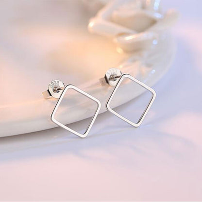 Silver earrings with geometric design